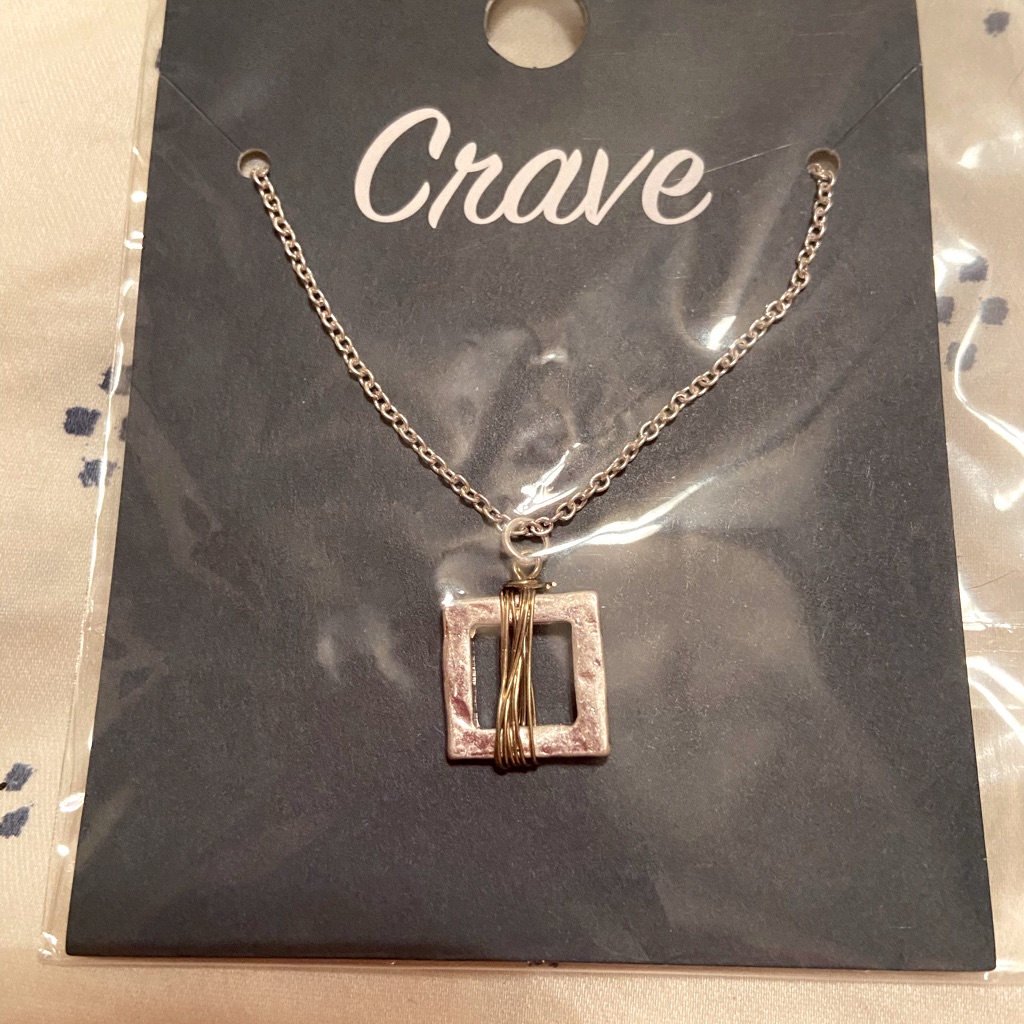 Silver Necklace With A Square Mixed Metal Pendant
